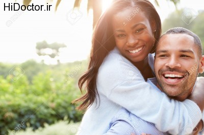 31066702-Portrait-Of-Loving-African-American-Couple-In-Countryside-Stock-Photo